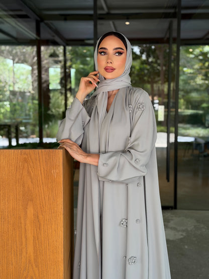 LAM203 – Soft grey A-line abaya in flowy Nada fabric, detailed with delicate - Image 1
